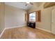 Spacious bedroom with wood floors and plantation shutters at 7500 Orange Haze Way, Las Vegas, NV 89149