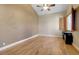 Light and airy bedroom featuring wood flooring at 7500 Orange Haze Way, Las Vegas, NV 89149