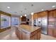 Spacious kitchen featuring granite countertops and island at 7500 Orange Haze Way, Las Vegas, NV 89149