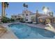 Inviting pool and spa with patio furniture and views at 7500 Orange Haze Way, Las Vegas, NV 89149