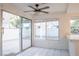 Kitchen with sliding door leading to backyard patio at 7608 Botany Bay Dr, Las Vegas, NV 89128