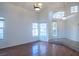 Spacious living room featuring hardwood floors and lots of natural light at 7608 Botany Bay Dr, Las Vegas, NV 89128