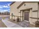 Side view of townhome showing another entrance and walkway at 7835 Pandora Sky St # 461, North Las Vegas, NV 89084