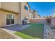 Backyard with artificial turf and patio at 8272 Southern Cross Ave, Las Vegas, NV 89131