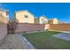 Backyard with artificial turf and patio at 8272 Southern Cross Ave, Las Vegas, NV 89131