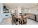 Open concept kitchen with island, dark cabinetry, and stainless steel appliances at 8272 Southern Cross Ave, Las Vegas, NV 89131