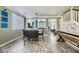 Spacious dining room with modern light fixture and game area at 9154 Cazador St, Las Vegas, NV 89123