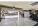 Organized garage with storage cabinets and flooring at 9154 Cazador St, Las Vegas, NV 89123