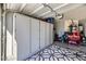 Garage with built-in storage and epoxy flooring at 9154 Cazador St, Las Vegas, NV 89123