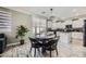 Kitchen nook with wood-look flooring and a round glass-top table at 9154 Cazador St, Las Vegas, NV 89123