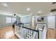 Bright loft area with hardwood floors and a workspace at 9154 Cazador St, Las Vegas, NV 89123