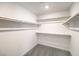 Large walk-in closet with double hanging rods at 9998 Ullom Dr # 16, Las Vegas, NV 89141