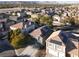 Aerial view of home with solar panels and mountain views at 10140 Heron Island Ave, Las Vegas, NV 89148