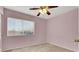 Spacious bedroom with ceiling fan and window blinds at 10140 Heron Island Ave, Las Vegas, NV 89148