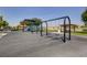 Community playground with swings and playset at 10374 Midnight Iris St, Las Vegas, NV 89183