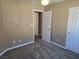 Bedroom featuring neutral carpet, ceiling fan, and a closet at 1142 Grass Pond Pl # 3, Henderson, NV 89002