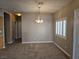 Dining room featuring modern lighting fixture and bright natural light at 1142 Grass Pond Pl # 3, Henderson, NV 89002