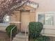 Townhouse entrance with stairs and landscaping at 1142 Grass Pond Pl # 3, Henderson, NV 89002