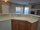Kitchen sink and breakfast bar in open concept living area at 1142 Grass Pond Pl # 3, Henderson, NV 89002