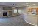 Spacious living room featuring a fireplace, ceiling fan, and window with bright natural light at 1142 Grass Pond Pl # 3, Henderson, NV 89002