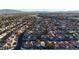 Aerial view of house in a residential neighborhood with mountain views at 1252 Little Sidnee Dr, Las Vegas, NV 89123