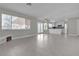 Bright living room with tile floors and kitchen access at 1252 Little Sidnee Dr, Las Vegas, NV 89123