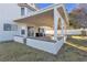 Covered patio with flagstone flooring and built-in seating at 1252 Little Sidnee Dr, Las Vegas, NV 89123