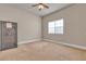 Simple bedroom with neutral walls, carpet flooring and a large safe at 1320 Robbers Roost Ave, Henderson, NV 89012