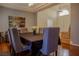 Formal dining room with hardwood floors and entryway view at 1349 Via Savona Dr, Henderson, NV 89052