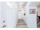 Bright entry hall with wood-look floors and access to other rooms at 1510 Princeton Cir, Pahrump, NV 89060