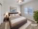 Bright bedroom with a king-size bed and ample natural light at 170 Rolling Fields Ct, Henderson, NV 89012