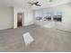 Bright bedroom featuring carpet, large windows, and en-suite bathroom access at 170 Rolling Fields Ct, Henderson, NV 89012