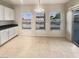 Bright kitchen nook with three windows and backyard view at 170 Rolling Fields Ct, Henderson, NV 89012