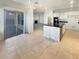 Kitchen with island, breakfast nook, and access to backyard at 170 Rolling Fields Ct, Henderson, NV 89012