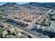 Wide aerial view of residential neighborhood and mountain backdrop at 185 Rocky Star St, Henderson, NV 89012