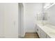 Double vanity bathroom with tile flooring and large mirror at 185 Rocky Star St, Henderson, NV 89012