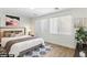 Spacious bedroom with neutral decor and hardwood floors at 185 Rocky Star St, Henderson, NV 89012