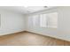Bright bedroom with hardwood floors and neutral walls at 185 Rocky Star St, Henderson, NV 89012