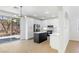 Modern kitchen with white cabinets, a large island, and stainless steel appliances at 185 Rocky Star St, Henderson, NV 89012