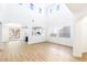 Open concept living room with high ceilings and hardwood floors at 185 Rocky Star St, Henderson, NV 89012
