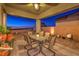 Covered patio with seating area, city views, and built-in grill at 2336 Indigo Island St, Henderson, NV 89044