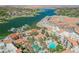 Aerial view showcasing the community with lake views and surrounding landscape at 30 Strada Di Villaggio # 115, Henderson, NV 89011