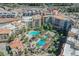 Lake Las Vegas condominiums featuring multiple community pools with lush landscaping at 30 Strada Di Villaggio # 115, Henderson, NV 89011