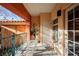 Private balcony with table and chairs, offering an outdoor space at 30 Strada Di Villaggio # 115, Henderson, NV 89011