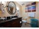 Full bathroom with shower, toilet, and vanity at 30 Strada Di Villaggio # 115, Henderson, NV 89011