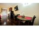 Small dining area with round table and four chairs at 30 Strada Di Villaggio # 115, Henderson, NV 89011