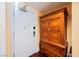 Entryway with wood cabinet and hardwood floors at 30 Strada Di Villaggio # 115, Henderson, NV 89011