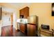 Small kitchenette with microwave, refrigerator, and coffee maker at 30 Strada Di Villaggio # 115, Henderson, NV 89011