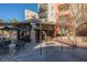 Charming patio with outdoor seating, perfect for enjoying meals, near community residences at 30 Strada Di Villaggio # 115, Henderson, NV 89011