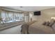 Main bedroom with bay window seating and built-in shelving at 3141 E Katie Ave, Las Vegas, NV 89121